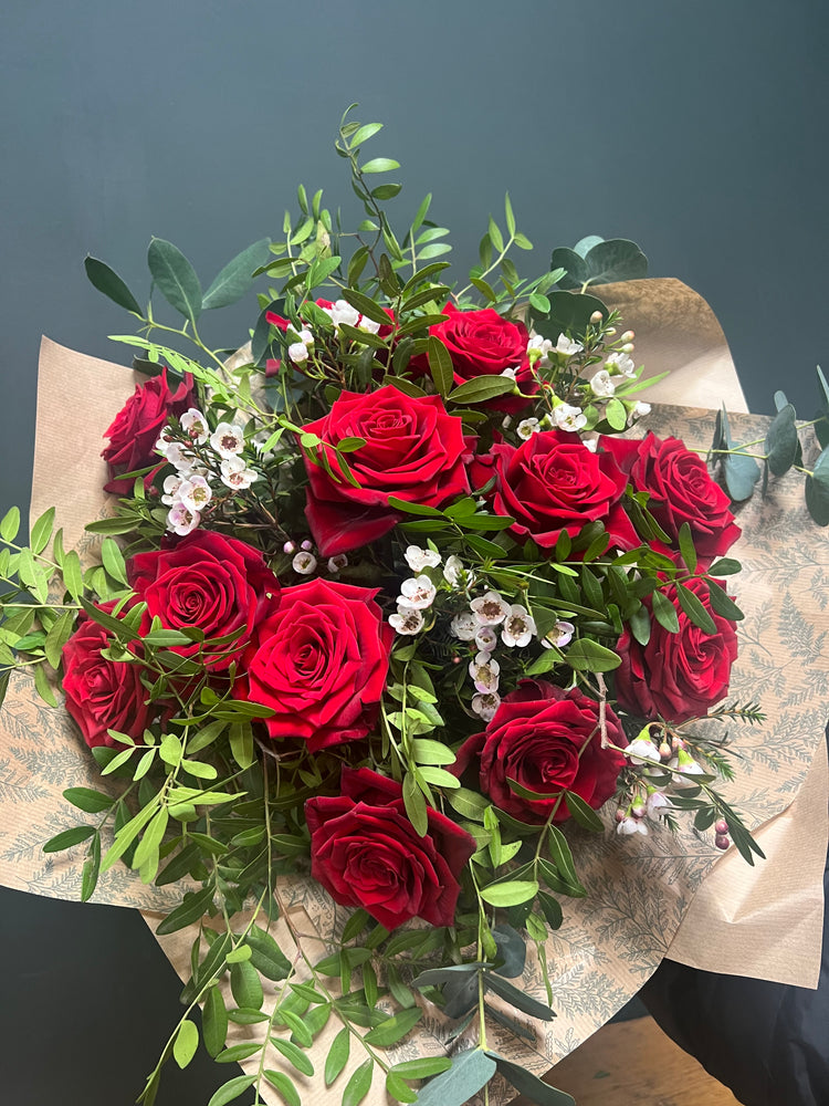 Stunningly Presented dozen red roses the perfect gift for valentines